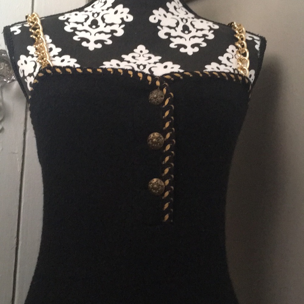 Black evening dress with beautiful details.